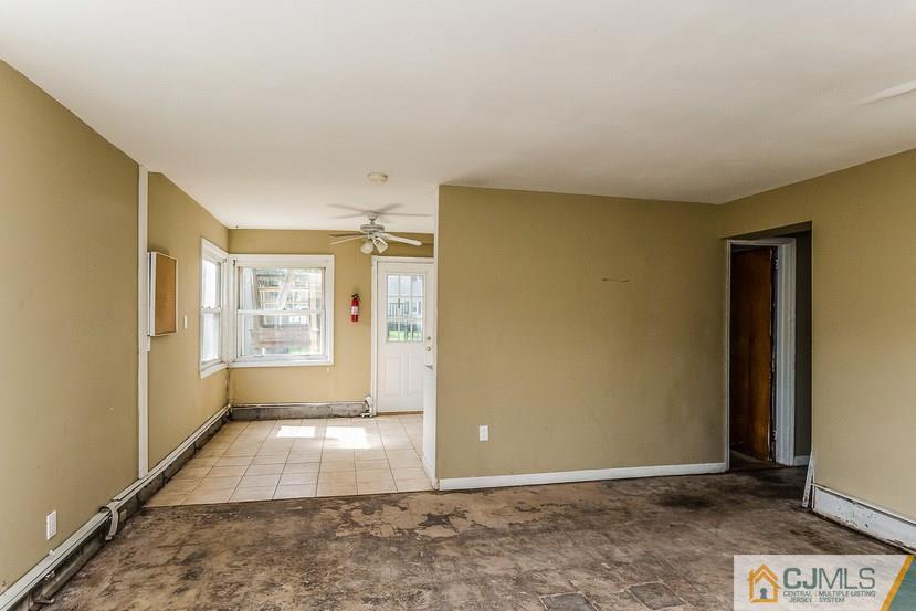 6 Mercury Road Edison, NJ 08817 - Photo 2 of 16 a view of an empty room and window