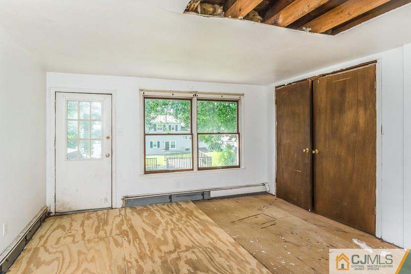 6 Mercury Road Edison, NJ 08817 - Photo 14 of 16 a view of an empty room with a window