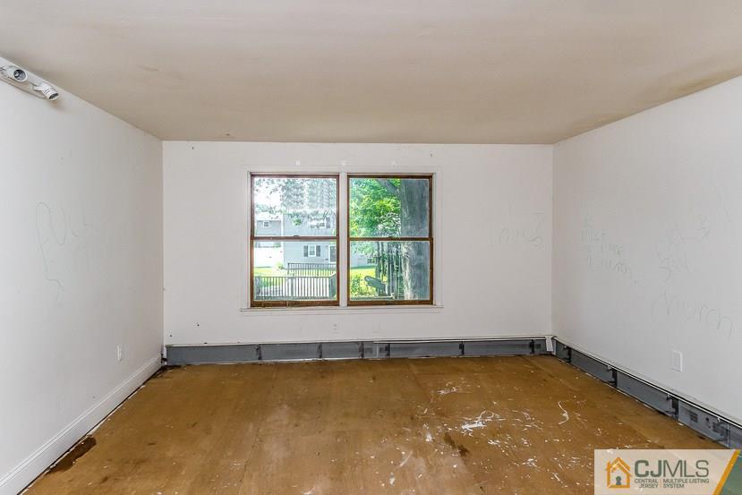 6 Mercury Road Edison, NJ 08817 - Photo 10 of 16 a view of an empty room with a window
