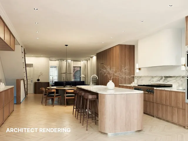 a room with stainless steel appliances kitchen island granite countertop a sink and cabinets