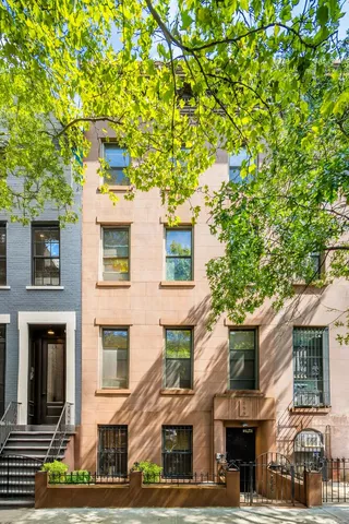 a front view of a building with street view