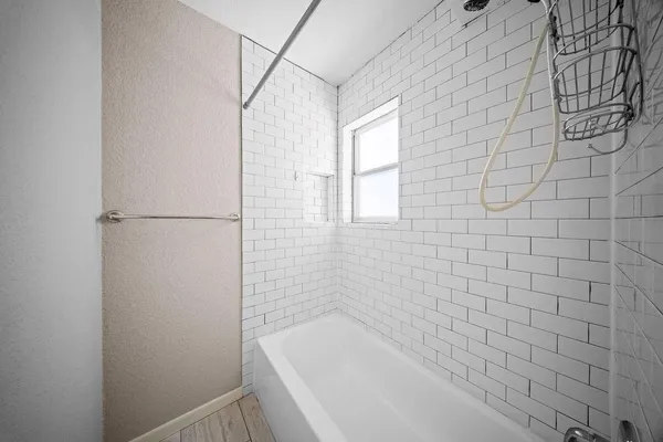 a bathroom with a bathtub