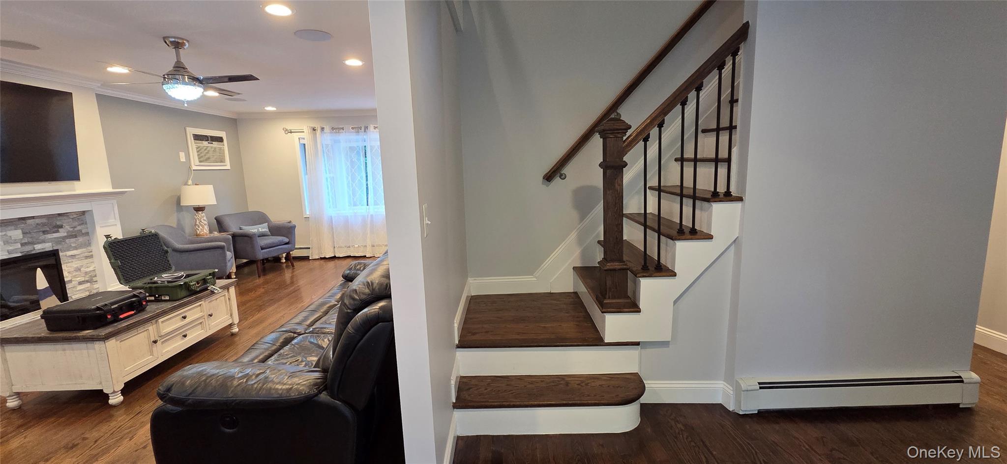 522 Moriches Road St. James, NY 11780 - Photo 7 of 49 a view of entryway and workspace with wooden floor