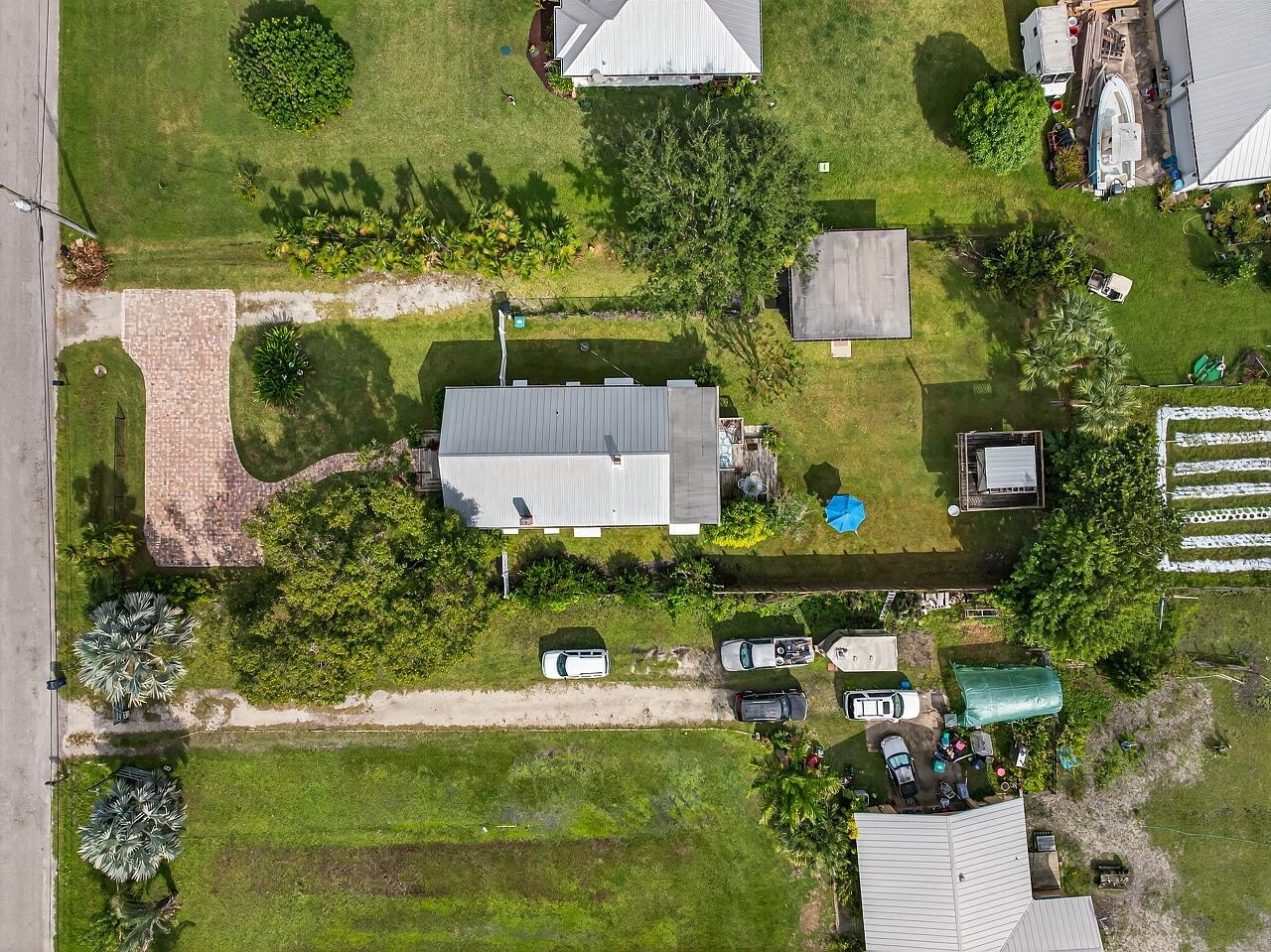 4876 Christensen Road Fort Pierce, FL 34981 - Photo 3 of 51 4876-Christensen-Rd-HigMedia-002-1280