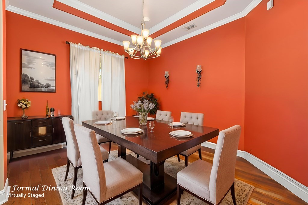 1171 Old Ewing Road Lufkin, TX 75901 - Photo 12 of 49 a view of a dining room with furniture and chandelier