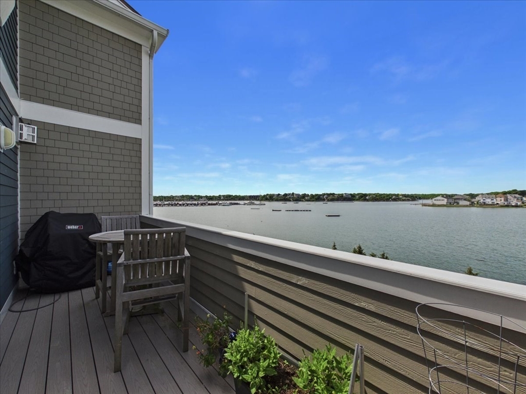7 Bay Street, Unit 3 Hull, MA 02045 - Photo 20 of 40 a view of a terrace with seating space