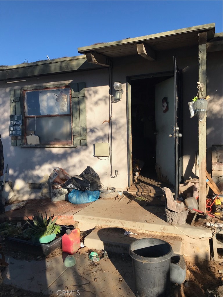 a room with furniture and a fireplace