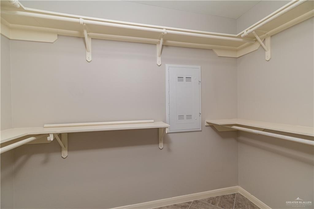 412 South Paseo Del Rey Street Mission, TX 78572 - Photo 12 of 15 Spacious closet with tile patterned floors