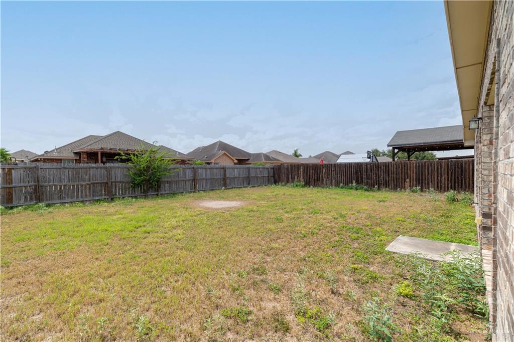 412 South Paseo Del Rey Street Mission, TX 78572 - Photo 14 of 15 View of fenced backyard