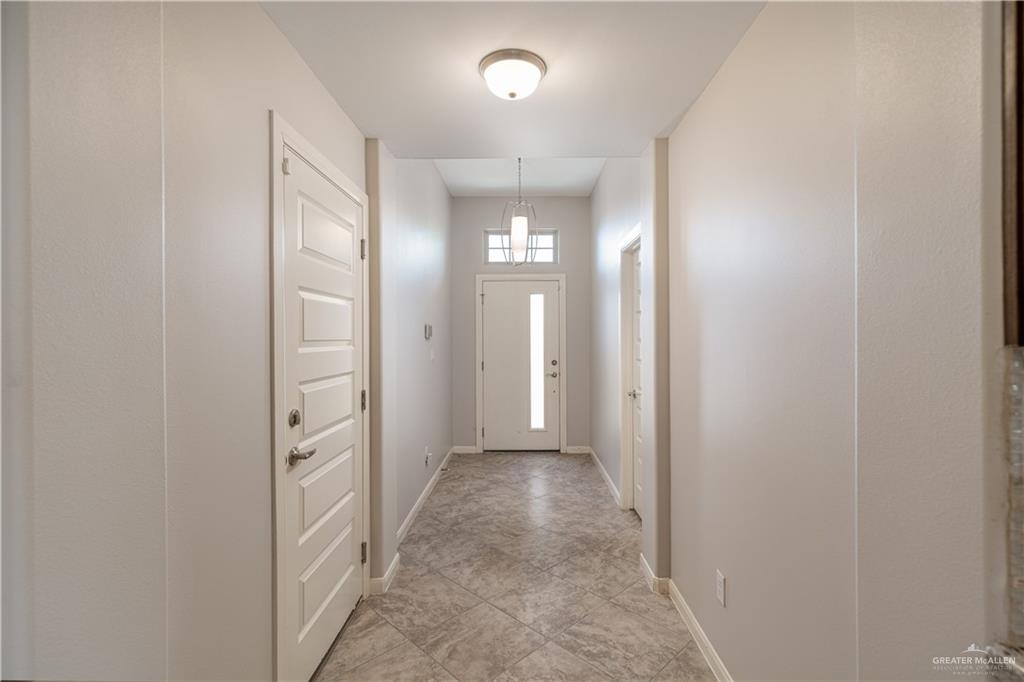 412 South Paseo Del Rey Street Mission, TX 78572 - Photo 2 of 15 Doorway to outside featuring baseboards