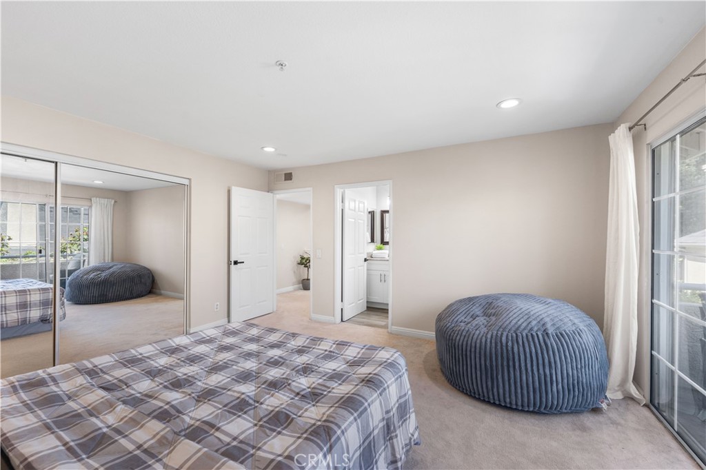 150 Diamond Street, Unit B Arcadia, CA 91006 - Photo 26 of 49 a bedroom with a bed and large window