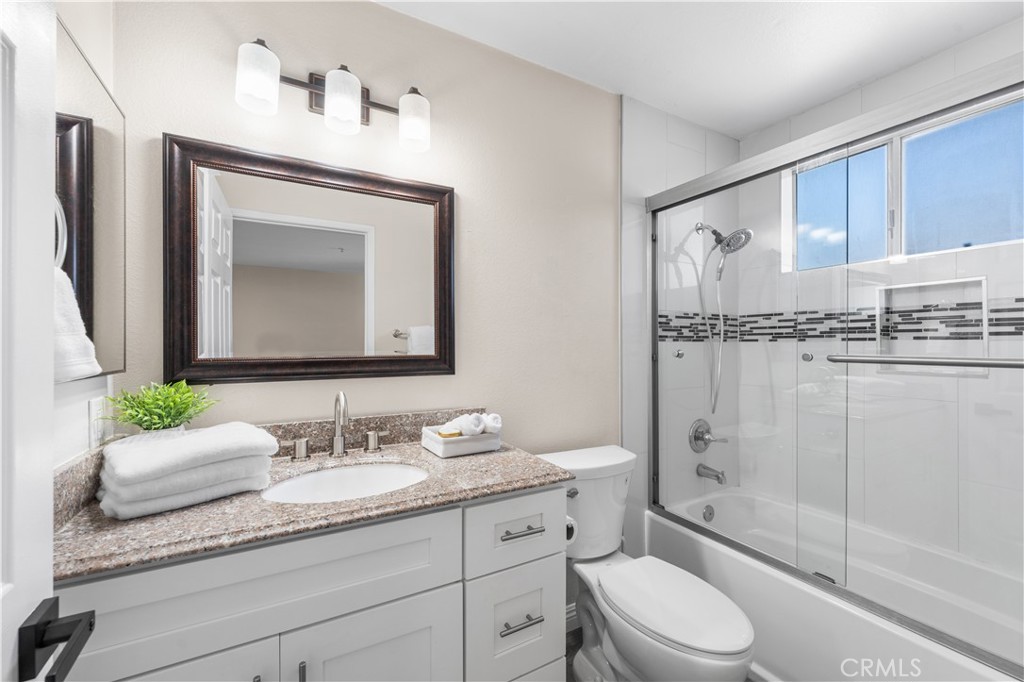 150 Diamond Street, Unit B Arcadia, CA 91006 - Photo 27 of 49 a bathroom with a granite countertop sink a toilet and shower