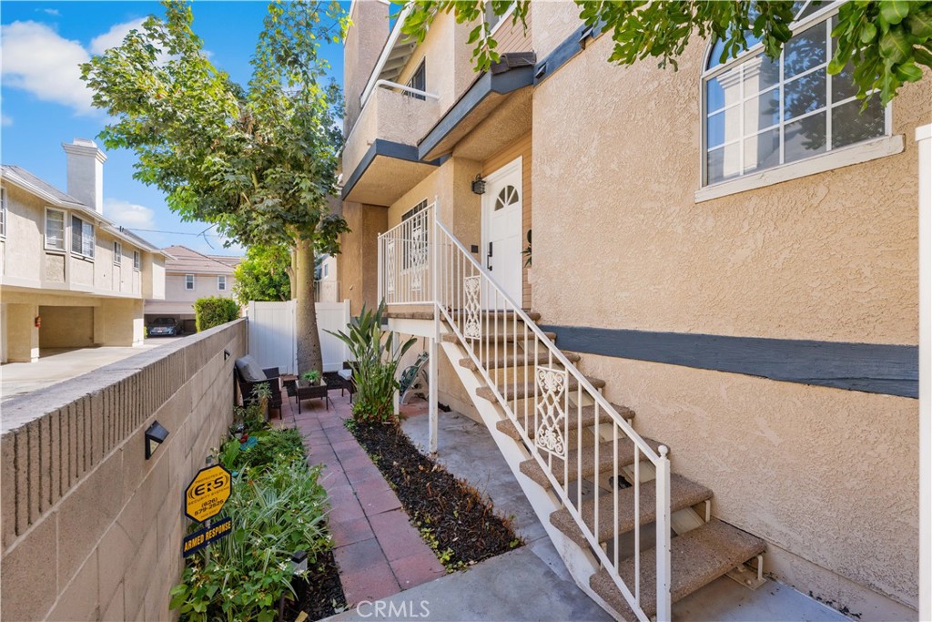 150 Diamond Street, Unit B Arcadia, CA 91006 - Photo 42 of 49 a view of a house with wooden stairs and a bench