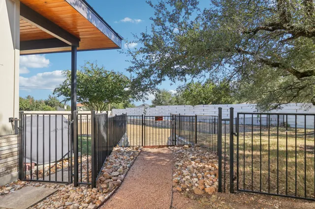 a view of a backyard with wooden floor