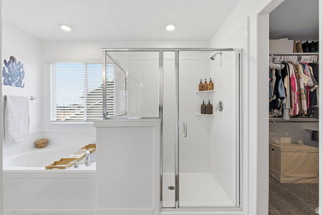 596 South Meade Street Mapleton, UT 84664 - Photo 17 of 38 Full bathroom with a walk in closet, a stall shower, a garden tub, and recessed lighting
