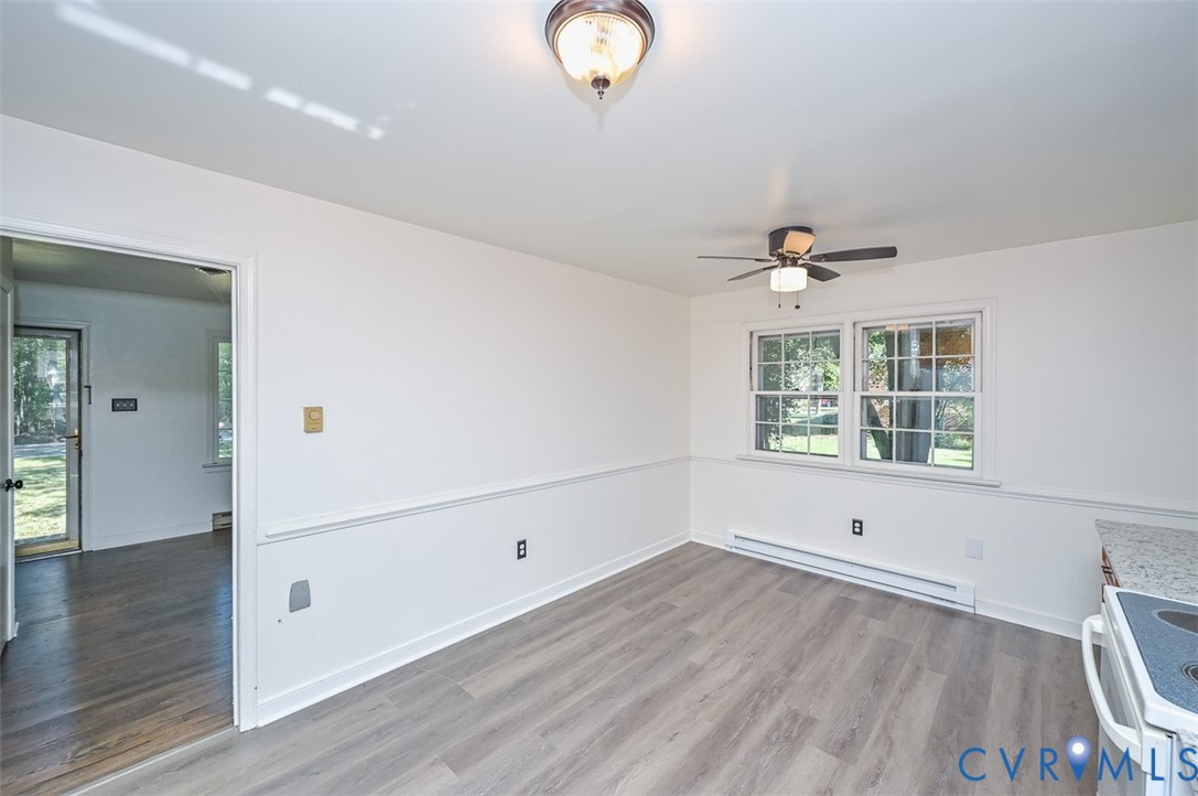 11331 Winterpock Road Chesterfield, VA 23838 - Photo 12 of 49 wooden floor in an empty room with a window