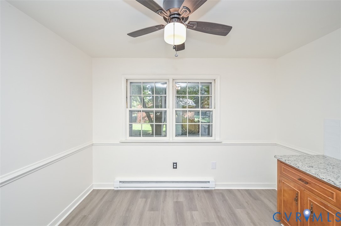 11331 Winterpock Road Chesterfield, VA 23838 - Photo 13 of 49 an empty room with a window and a ceiling fan