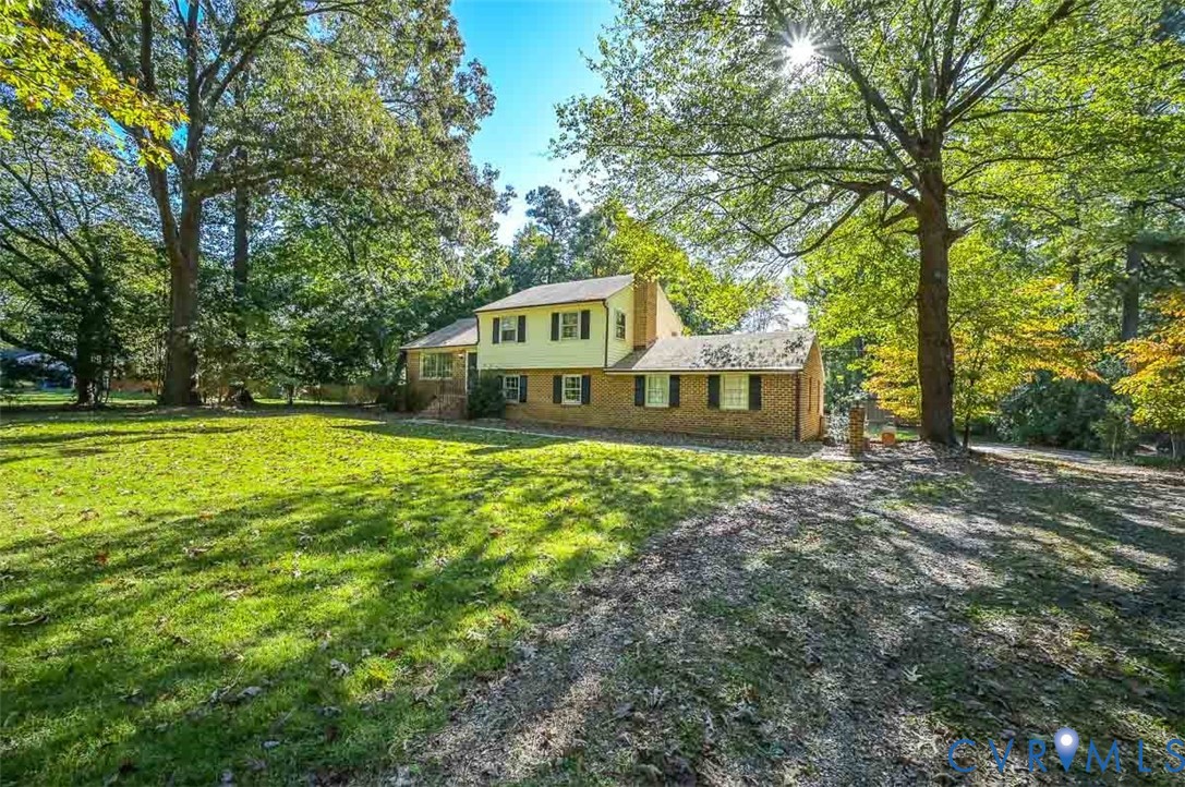 11331 Winterpock Road Chesterfield, VA 23838 - Photo 4 of 49 a front view of a house with a yard