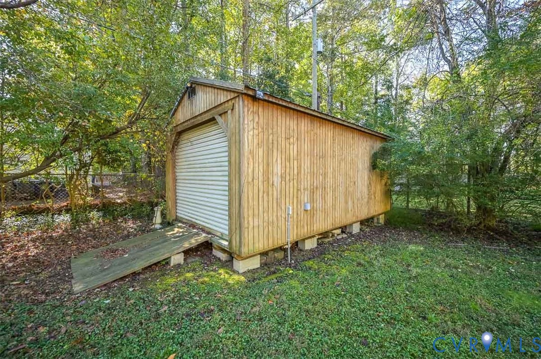 11331 Winterpock Road Chesterfield, VA 23838 - Photo 46 of 49 a backyard of a house with lots of green space