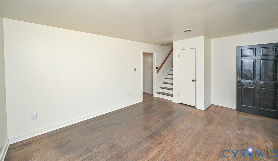 11331 Winterpock Road Chesterfield, VA 23838 - Photo 7 of 49 a view of an empty room with wooden floor