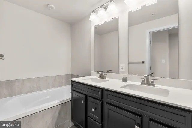 a bathroom with a sink and a bathtub