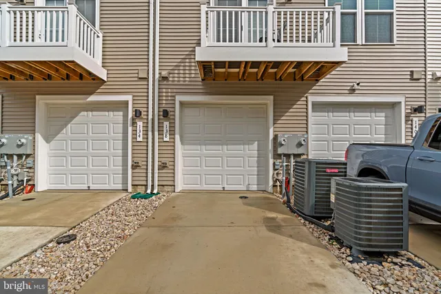 a front view of a house with a garage