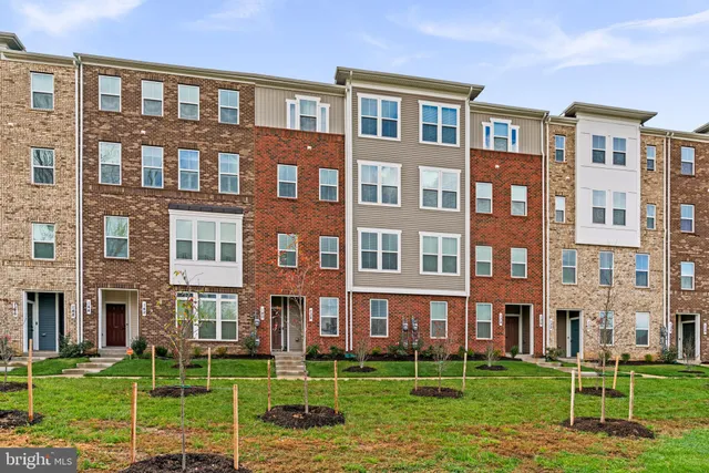 a brick building with a lots of windows in it