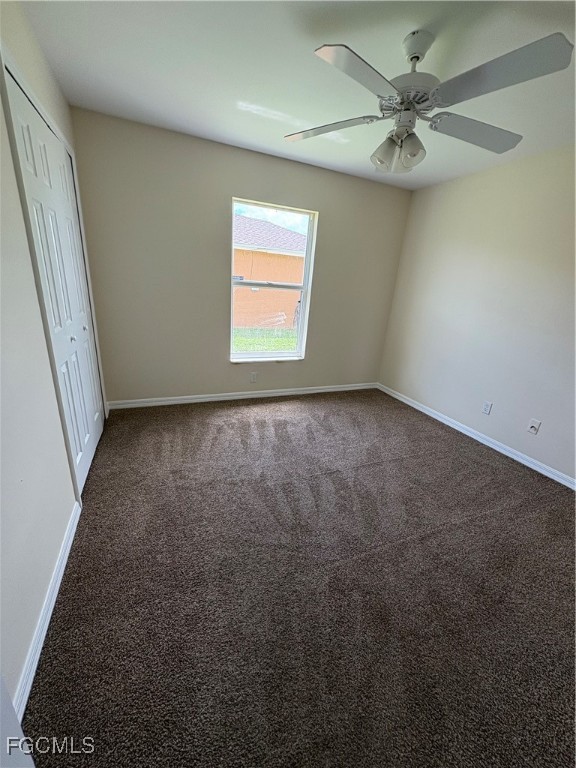 1635 Southwest 32nd Terrace Cape Coral, FL 33914 - Photo 13 of 15 an empty room with a window