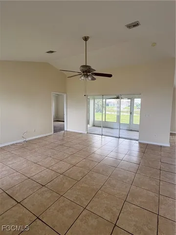 a view of an empty room and window