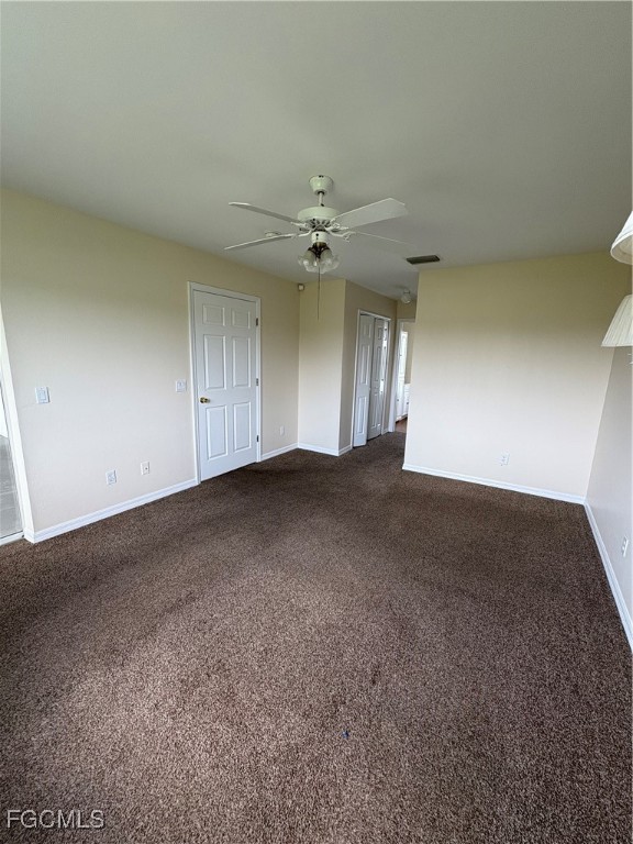 1635 Southwest 32nd Terrace Cape Coral, FL 33914 - Photo 9 of 15 an empty room with a ceiling fan and fan