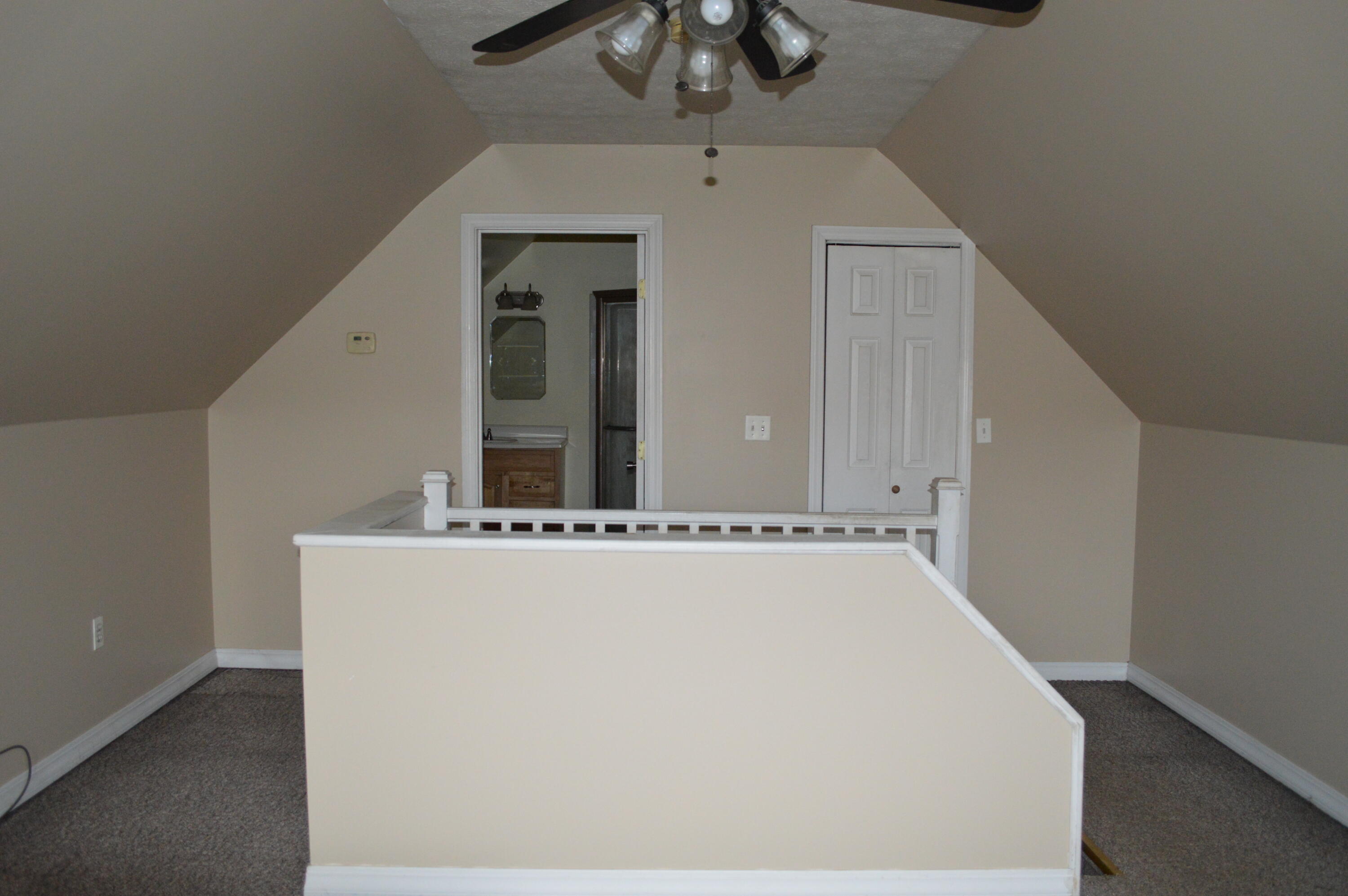 153 Pelletier Road Fort Kent, ME 04743 - Photo 33 of 36 Master looking to stairway, master bath,