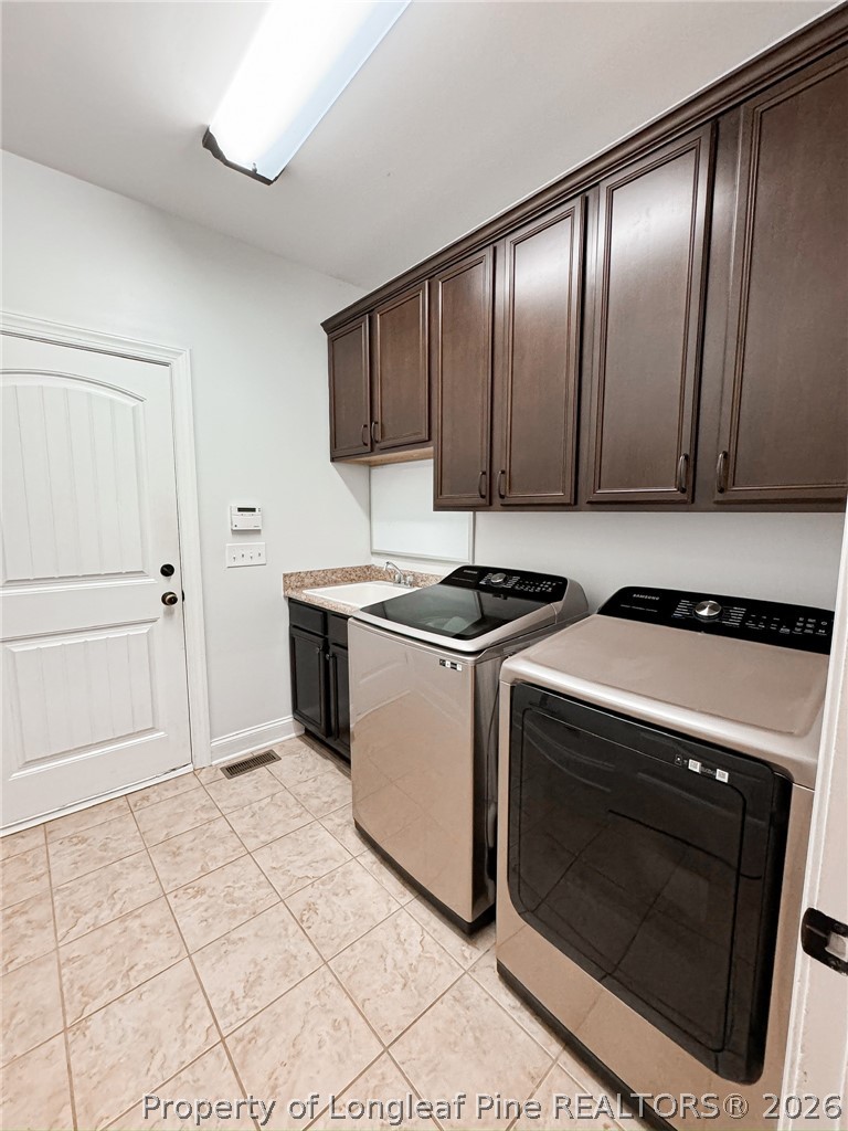 93 Falcon Ridge Drive Spring Lake, NC 28390 - Photo 20 of 50 a utility room with washer and dryer