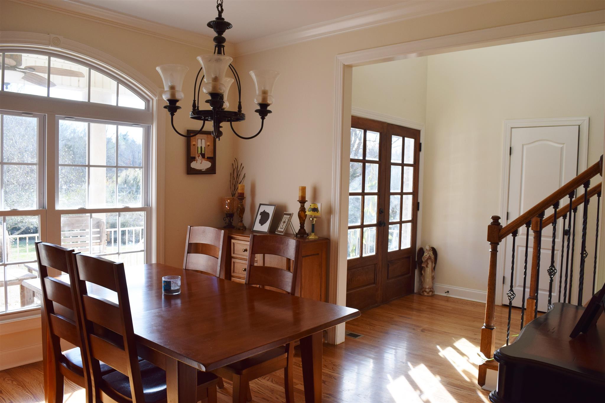 7418 Liberty Road Fairview, TN 37062 - Photo 4 of 18 a view of a dining room with furniture window and wooden floor