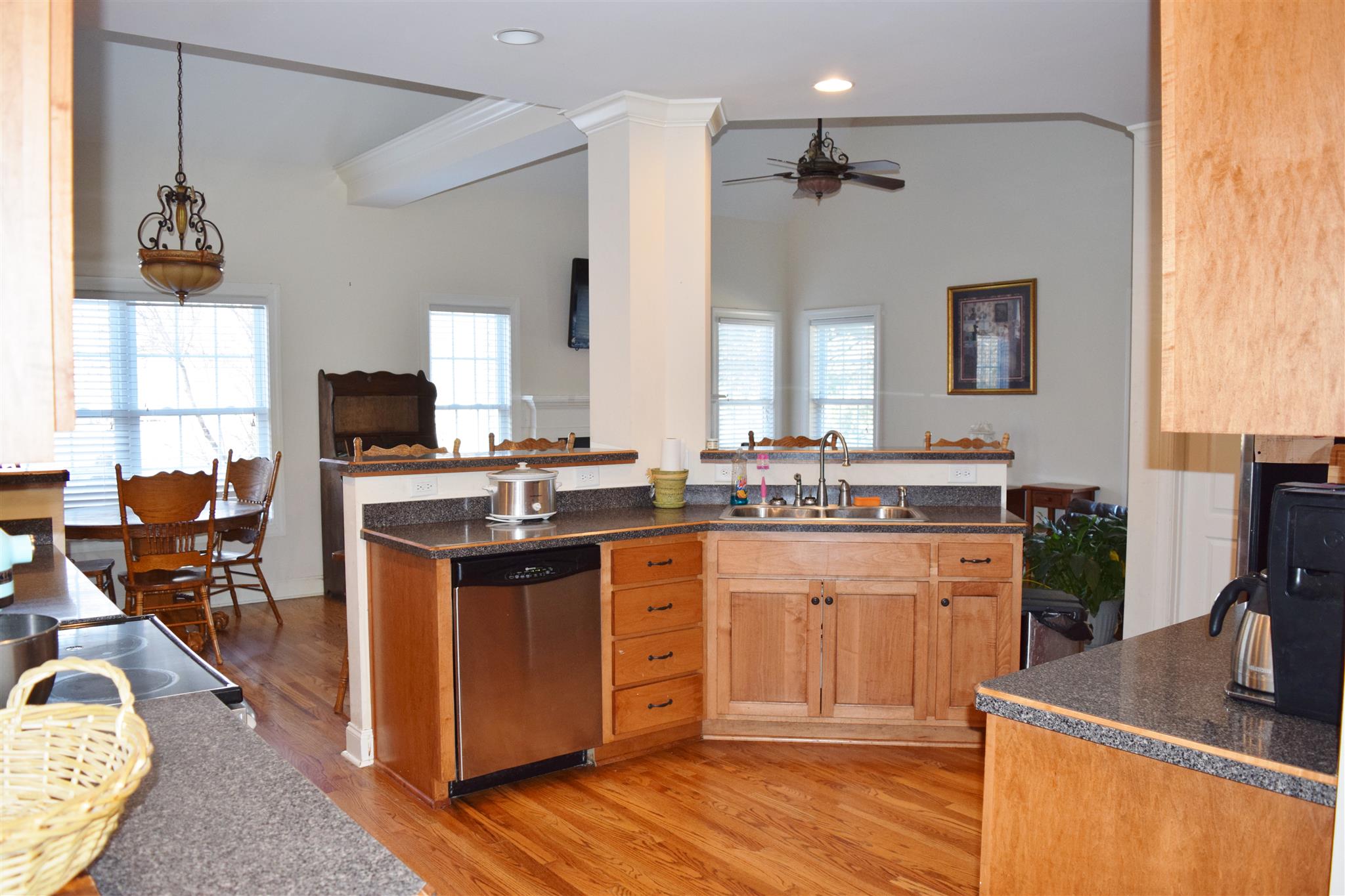 7418 Liberty Road Fairview, TN 37062 - Photo 8 of 18 a kitchen with stainless steel appliances granite countertop a sink stove and refrigerator