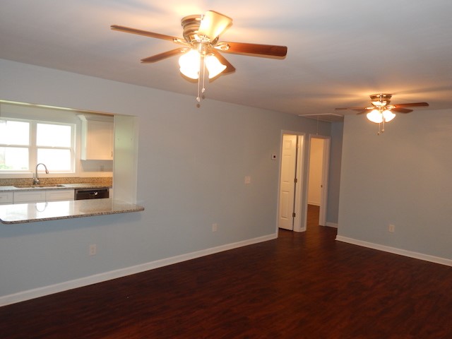 104 Leah Drive Pendleton, SC 29670 - Photo 3 of 17 This inviting space features an open layout connecting living areas with rich flooring.