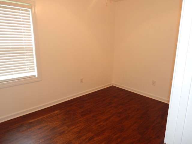 104 Leah Drive Pendleton, SC 29670 - Photo 6 of 17 This spacious room features rich wood flooring, crisp white walls, and abundant natural light.
