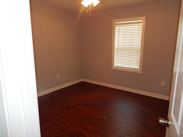 104 Leah Drive Pendleton, SC 29670 - Photo 8 of 17 This spacious room offers warm wood flooring and a bright window, creating a serene atmosphere.