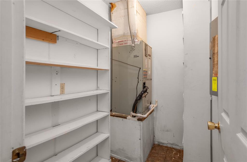 4893 South Old Floral City Road Inverness, FL 34450 - Photo 15 of 31 a view of walk in closet with empty racks