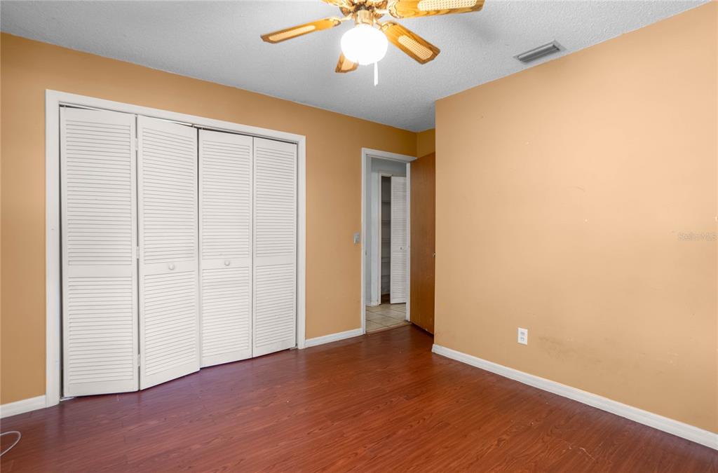 4893 South Old Floral City Road Inverness, FL 34450 - Photo 20 of 31 an empty room with a ceiling fan