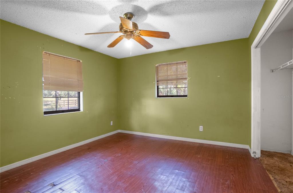 4893 South Old Floral City Road Inverness, FL 34450 - Photo 22 of 31 a view of room with window and ceiling fan
