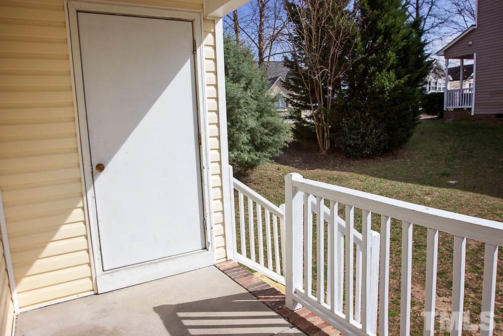 4308 Windstorm Way Raleigh, NC 27616 - Photo 4 of 16 a view of a balcony with wooden floor