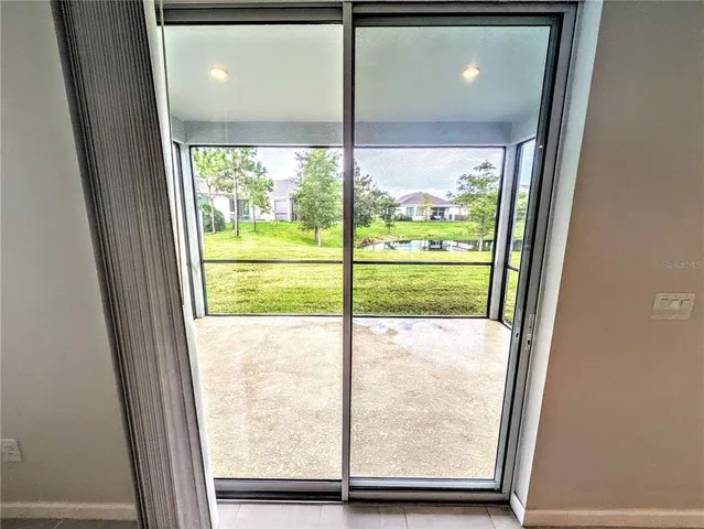 a view of a garden with houses