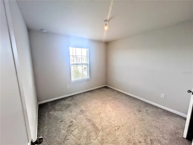 a bathroom with a double vanity sink toilet and shower