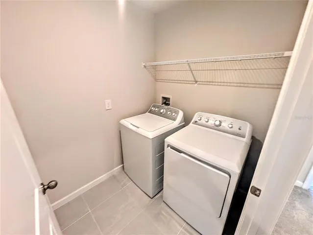 a swimming pool with some trees in the background