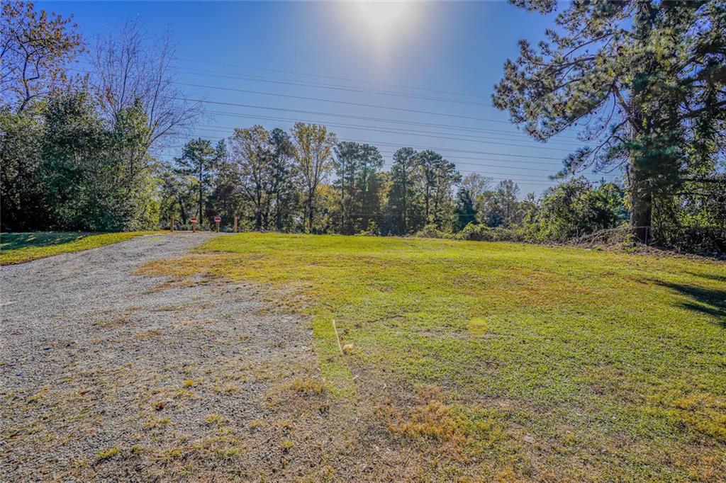 2877 Whispering Hills Drive, Unit 2877 Atlanta, GA 30341 - Photo 17 of 17 a view of a field with an trees