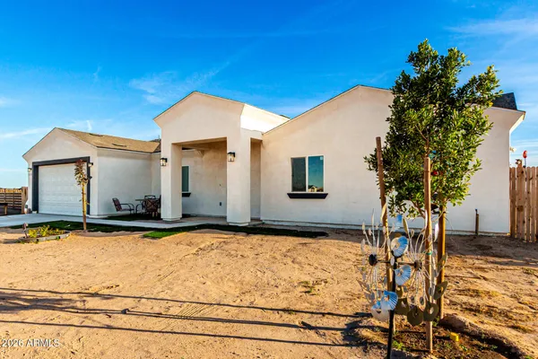 a house with trees in front of it