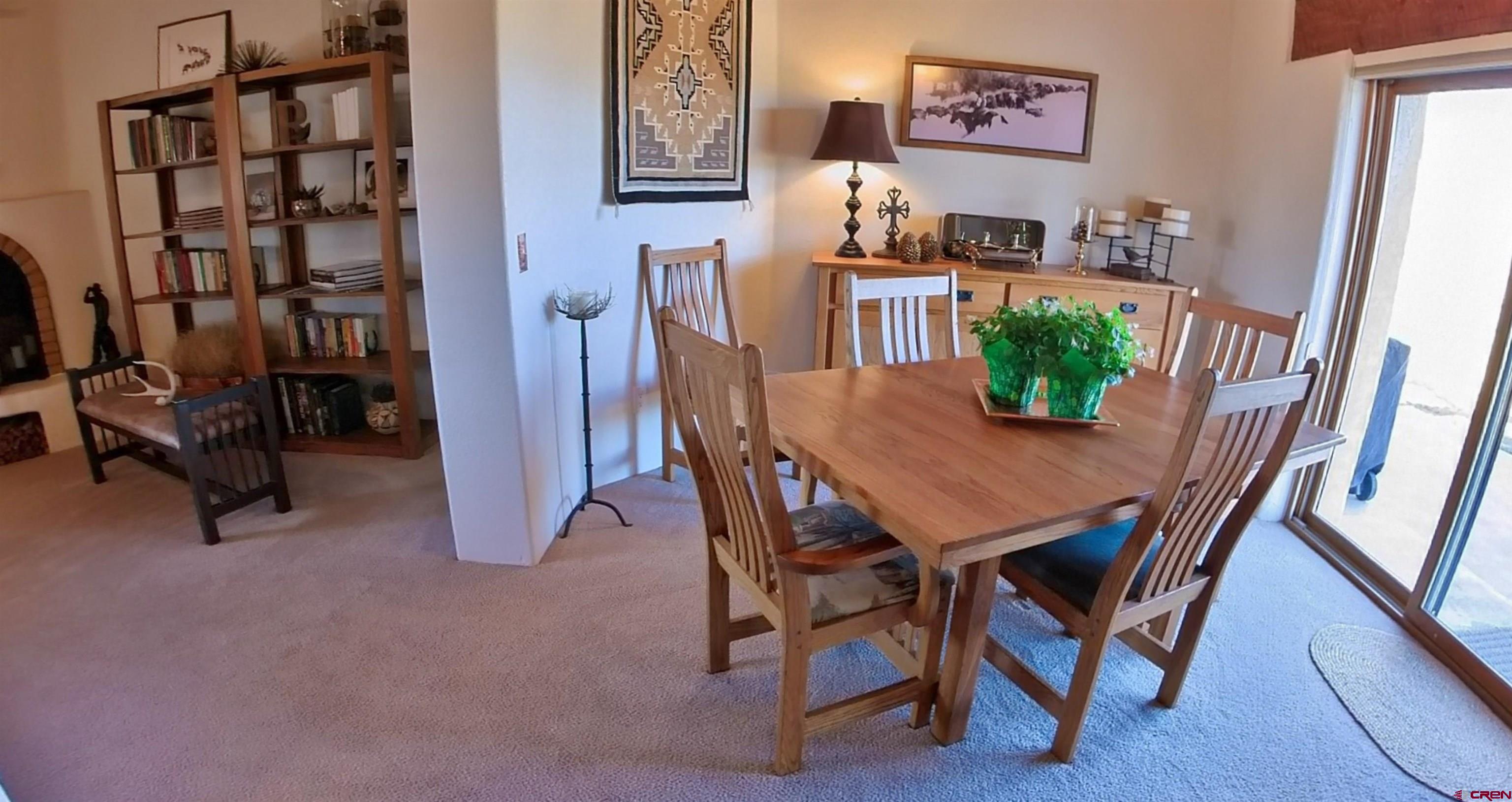 1789 G Road Delta, CO 81416 - Photo 6 of 28 a dining room with furniture and wooden floor