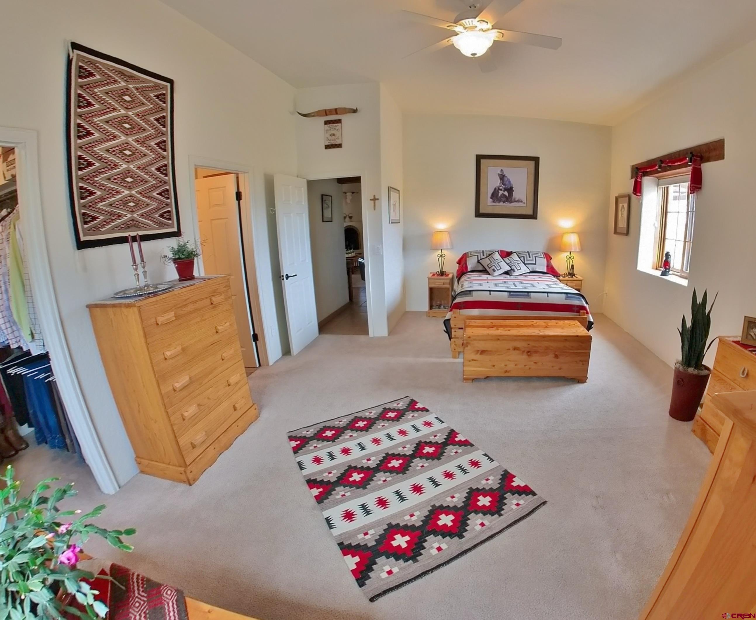 1789 G Road Delta, CO 81416 - Photo 9 of 28 a living room with furniture and a baby crib