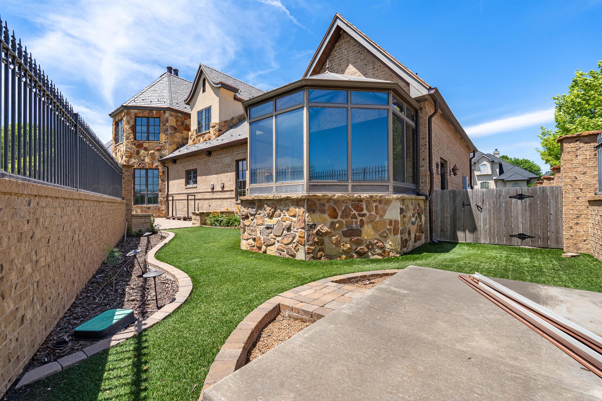 18 Cypress Point Amarillo, TX 79124 - Photo 20 of 95 a front view of a house with garden