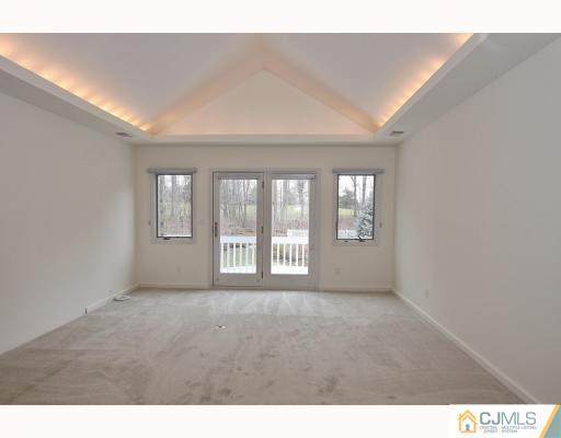 2 Wendover Road Edison, NJ 08820 - Photo 8 of 10 a view of an empty room with a window